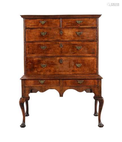 A walnut chest on stand