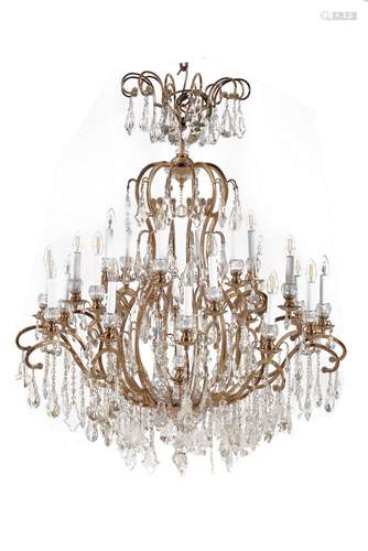 A substantial French gilt metal and cut and moulded glass twenty-five light chandelier