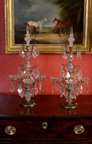 A pair of cut and moulded glass candle lustres