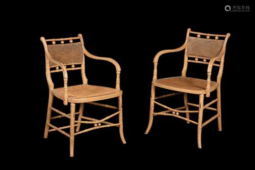 A pair of Regency simulated bamboo open armchairs