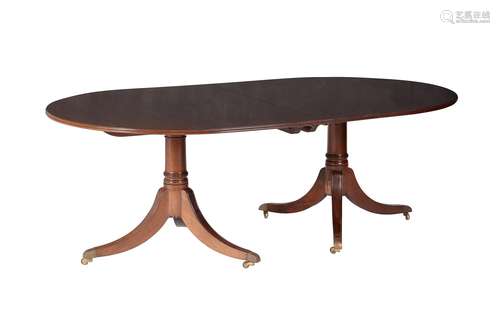 A mahogany twin pedestal dining table