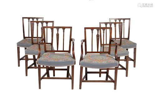 A set of twelve mahogany dining chairs in George III style