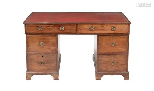 A mahogany twin pedestal desk