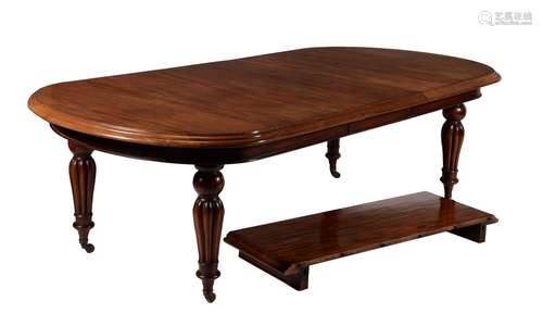 A Victorian mahogany extending dining table