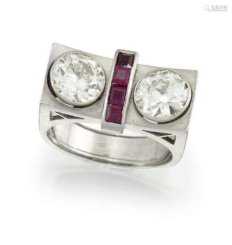 An Art Deco, gold, diamond and ruby ring, of odeonesque design, composed of two old-brilliant-cut