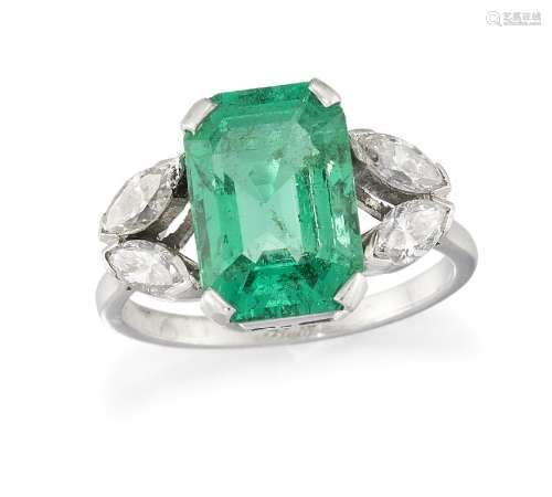 An emerald and diamond ring, the cut-cornered rectangular emerald to marquise-cut diamond two