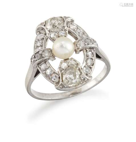 A platinum, diamond and pearl oval cluster ring, of openwork quatrefoil design, the central pearl (