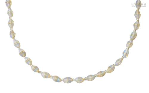 An opal necklace, composed of a single row of opal and faceted rock crystal three stone beads to a