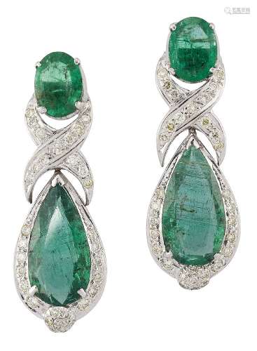 A pair of emerald and diamond pendant earrings, the pear shaped emerald drops with brilliant-cut