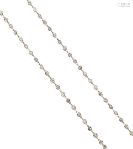 A platinum and diamond necklace, designed as a single row of collet-set circular cut diamond spacers