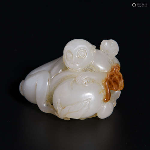 A WHITE JADE PENDANT WITH DOUBLE MONKEYS