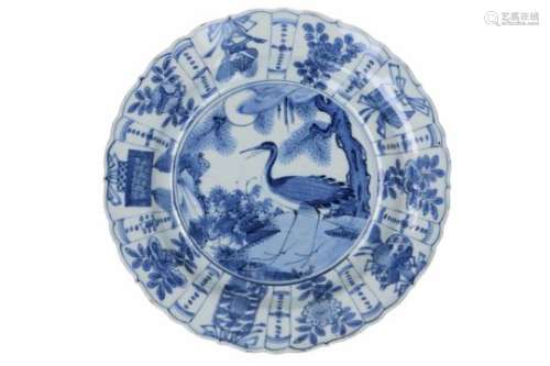 A blue and white 'kraak' porcelain dish, decorated with a bird. Unmarked. China, Wanli.