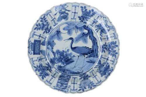 A blue and white 'kraak' porcelain dish, decorated with a bird. Unmarked. China, Wanli.