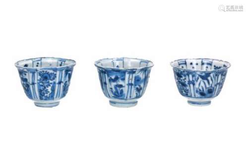 A lot of three blue and white porcelain bowls, decorated with flowers, birds and butterflies.