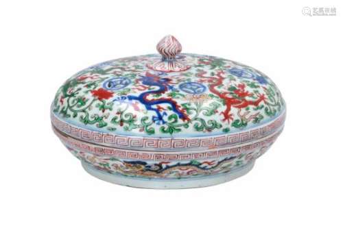 A Wucai porcelain lidded bowl, decorated with dragons and flowers. The bowl with nine