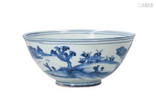 A blue and white porcelain bowl, decorated with figures playing a game of Go in a mountainous
