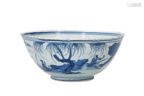 A blue and white porcelain bowl, decorated with a past-master in a mountainous river landscape.