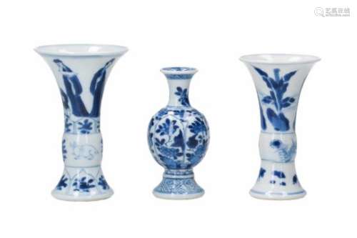 Lot of three diverse blue and white porcelain miniature vases, decorated with flowers, figures,