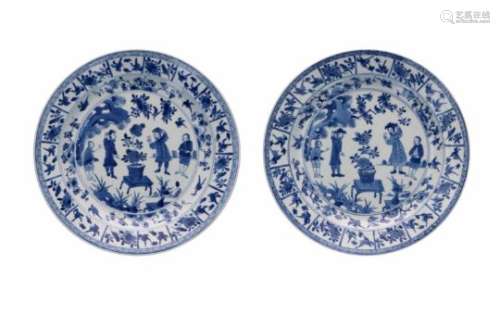 A pair of blue and white Chine de Commande porcelain dishes, decorated with flowers, birds and