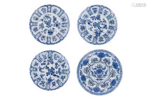 A set of three blue and white porcelain dishes, decorated with flowers. Marked with 6-character mark
