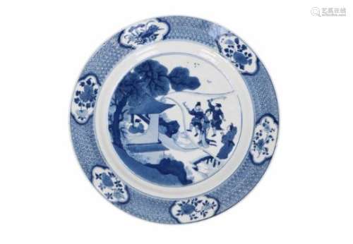 A blue and white porcelain charger, decorated with a dream. Marked with 6-character mark Chenghua.