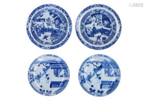 Two pairs of blue and white porcelain dishes, decorated with figures. One pair marked with symbol.