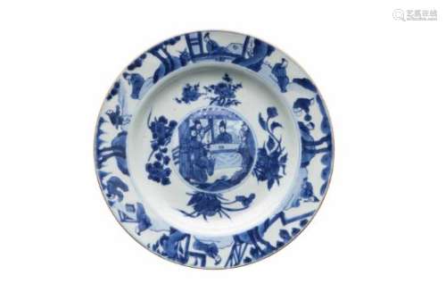 A blue and white porcelain dish with elevated center, decorated with figures and flowers.