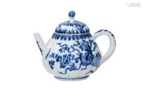 A blue and white porcelain teapot with lobed belly and cover, decorated with flowers. Unmarked.