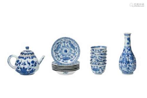 A set of six blue and white porcelain cups with saucers, decorated with flowers. Marked with seal