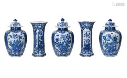 A five-piece blue and white porcelain garniture, decorated with flowers. Unmarked. China, Kangxi.