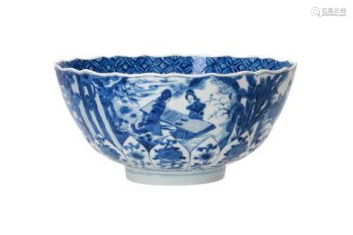 A blue and white porcelain bowl with scalloped rim, decorated with ladies in a garden and flowers.