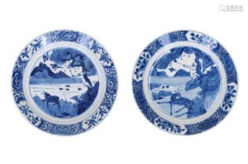 Lot of two blue and white porcelain saucers, decorated with a monkey and a deer. One marked with 6-
