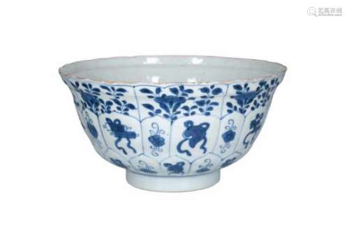 A blue and white porcelain bowl, decorated with flowers and antiquities. The center with three