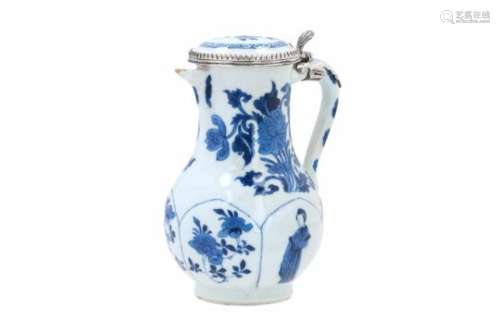 A blue and white porcelain lidded jug with silver mountings, decorated with long Elizas and flowers.