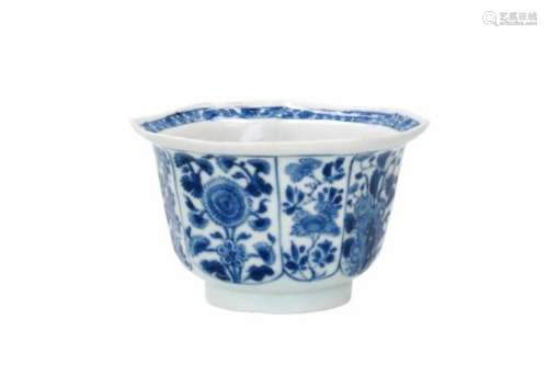 An octagonal blue and white porcelain bowl, decorated with flowers. Marked with flower. China,