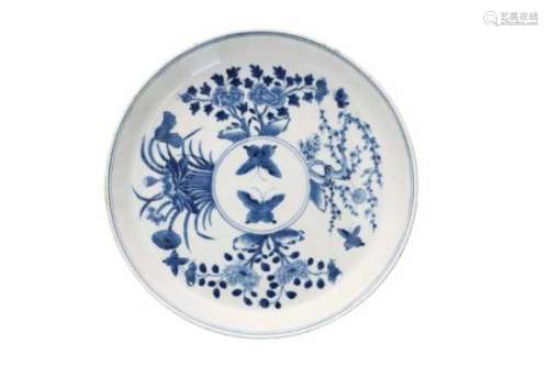 A blue and white porcelain deep dish, decorated with flowers and butterflies. Marked with 4-