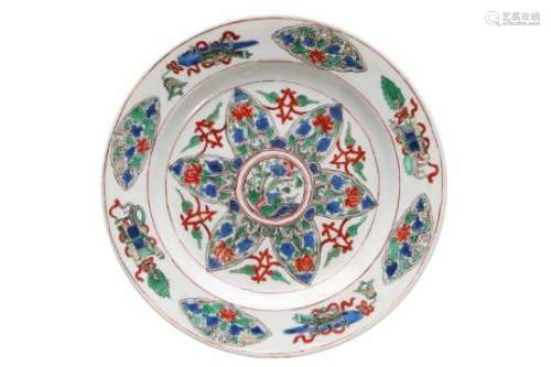 A famille verte porcelain dish, decorated with flowers and antiquities. Marked with symbol. China,