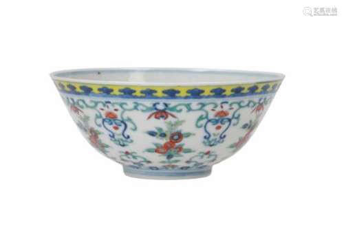 A Doucai porcelain bowl, decorated with flowers. Marked with seal mark. China, Daoguang.