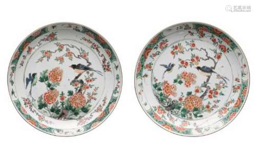 Two famille verte porcelain chargers, decorated with birds, flowers and butterflies. Unmarked.
