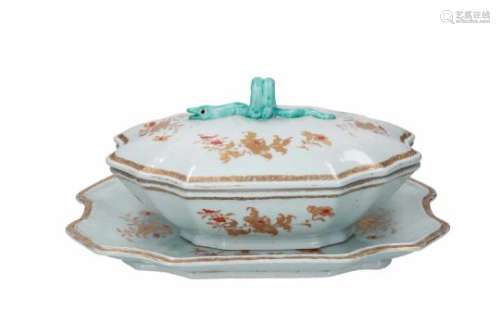 A polychrome porcelain tureen with dish, decorated with flowers. The grip in the shape of a snake.