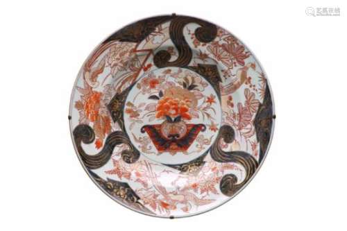 An Imari porcelain deep charger, decorated with birds and flowers. Unmarked. Japan, Edo, 18th