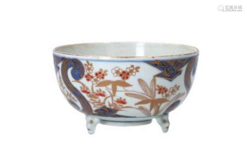 An Imari porcelain tripod bowl, decorated with flowers and a flower vase. Unmarked. Japan, ca.