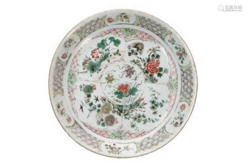 A famille rose porcelain deep charger, decorated with flowers. Marked with seal mark. China, 18th