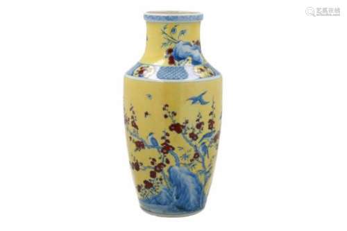 A polychrome porcelain vase, decorated with birds and flowers on yellow background. Unmarked. China,
