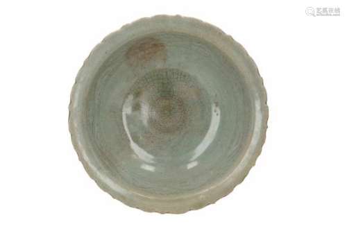 A celadon stoneware bowl with scalloped rim. Unmarked. Thailand, Sawankhalok, 15th/16th century.