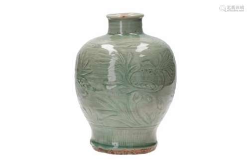 A celadon glazed vase, with carved decor of leaves. Unmarked. China, Longquan, 18th century.