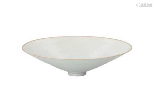 A monochrome qingbai molded porcelain bowl. Unmarked. China, 20th century. Provenance: bought at