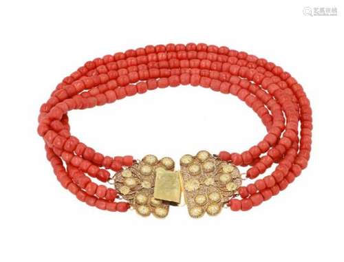 A five-strand red coral necklace with 18-kt golden clasp. Diam. approx. 6.8 - 9.9 mm. Total weight