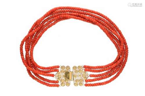 A five-strand red coral necklace with golden clasp. Diam. approx. 4.6 - 5.9 mm. Total weight approx.