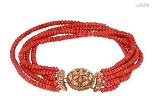 A five-strand red coral necklace with 14-kt golden clasp. Diam. approx. 6.4 - 7.6 mm. Total weight